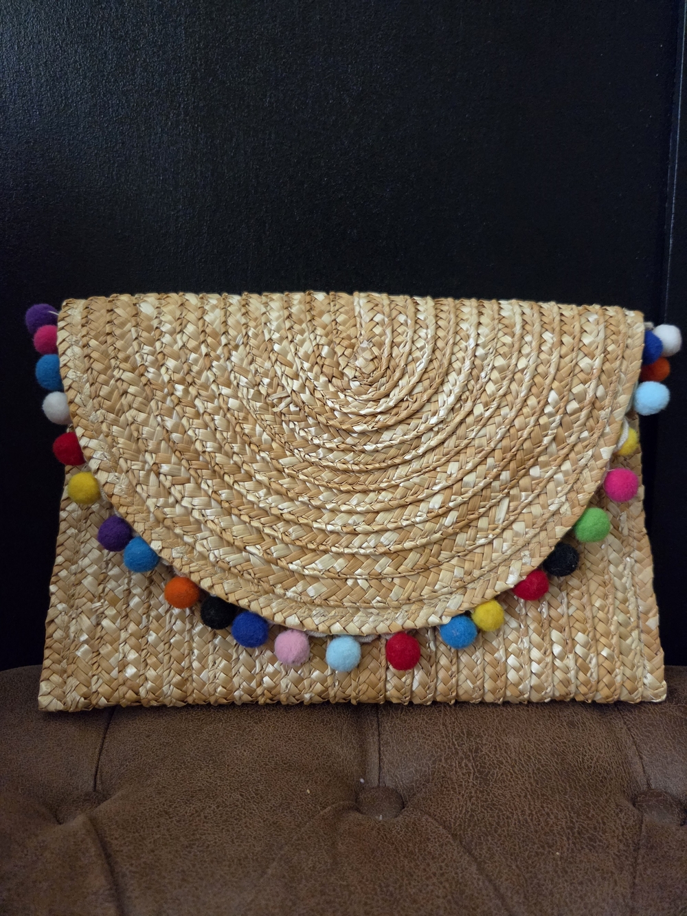 Woven Straw Pom Pom Clutch